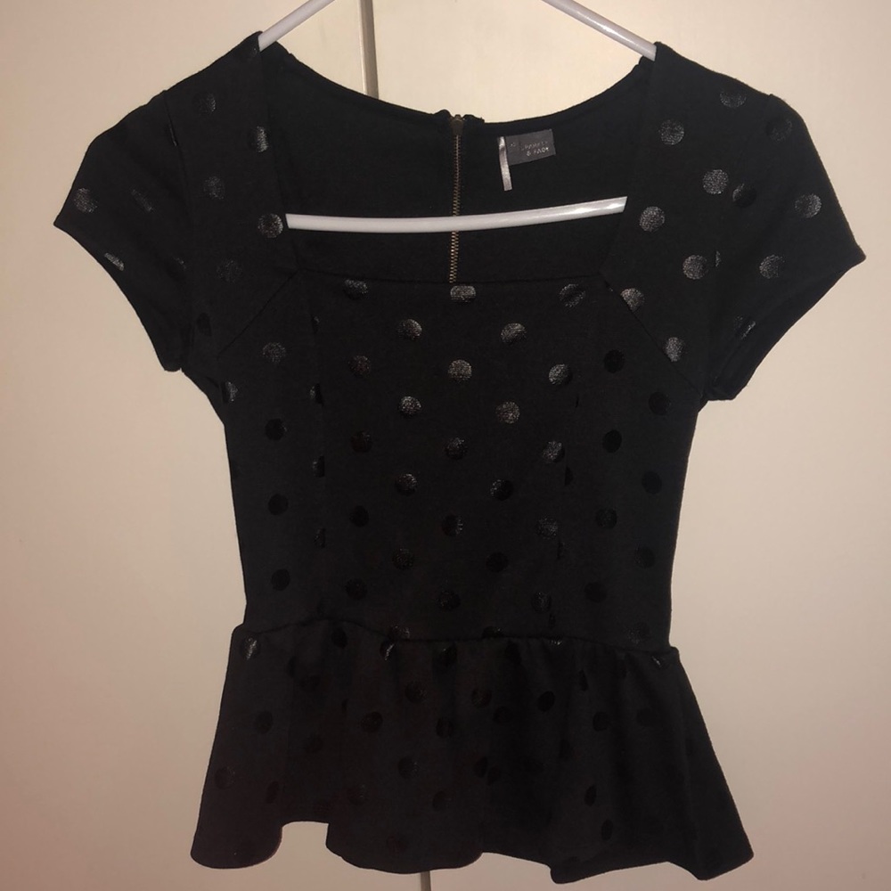 Black polka dot peplum top